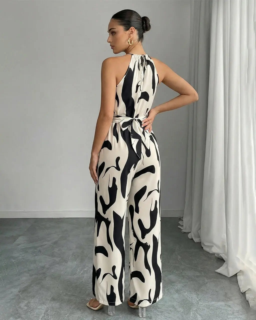 Abstract-Print Halter Jumpsuit – Twist Front, Tie Waist and Wide Legs