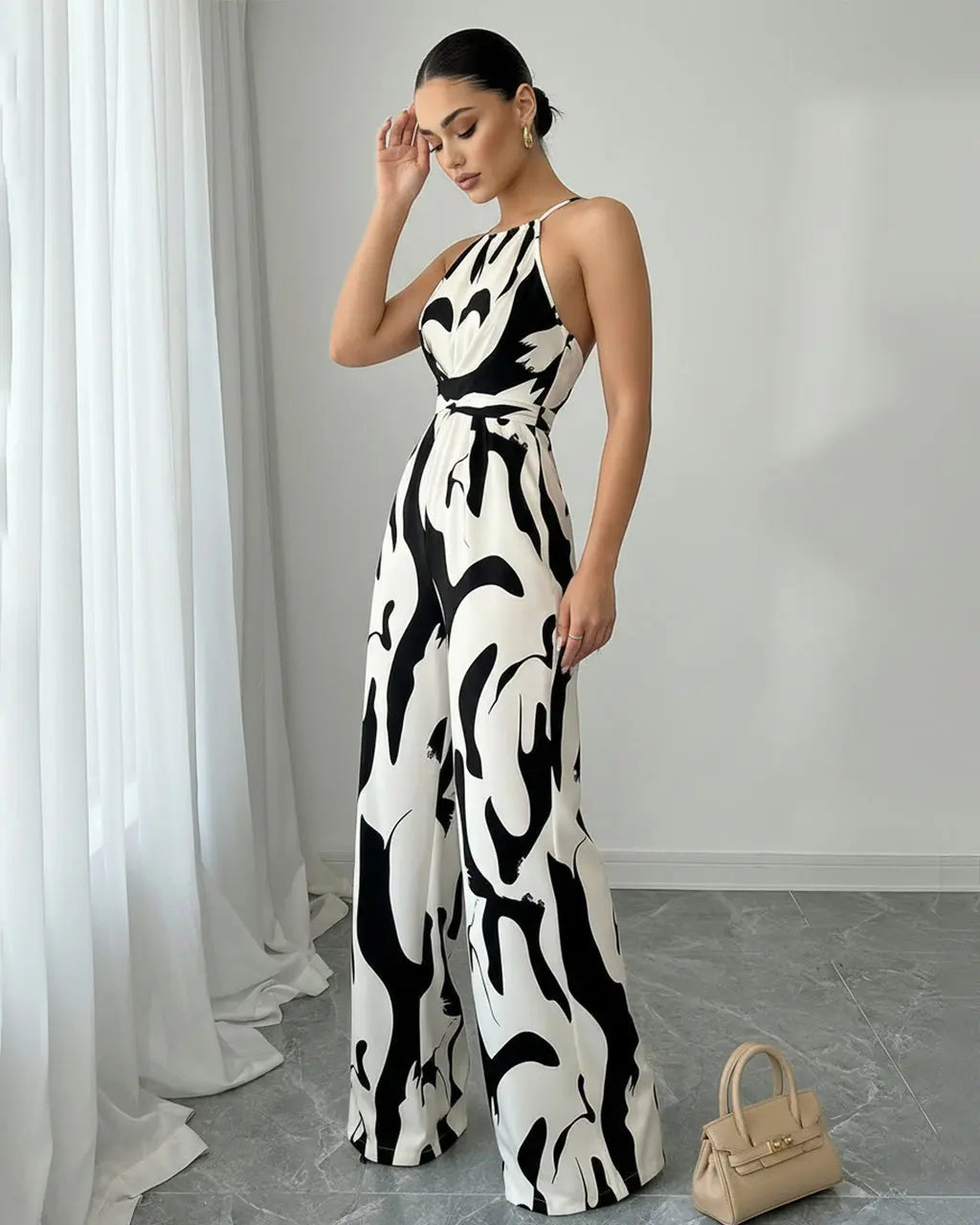 Abstract-Print Halter Jumpsuit – Twist Front, Tie Waist and Wide Legs