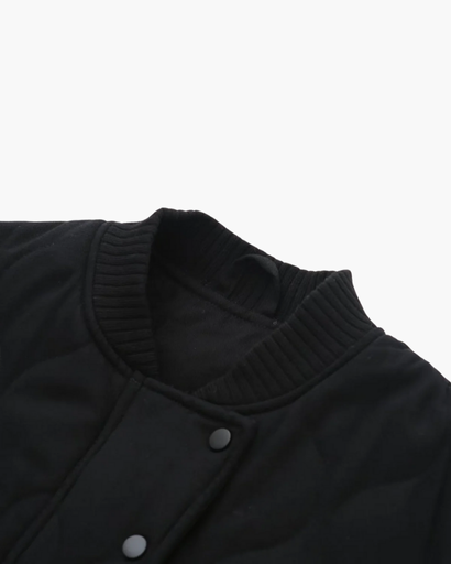 Women’s Oversized Quilted Jacket – Wavy Stitching, Ribbed Trim and Pockets